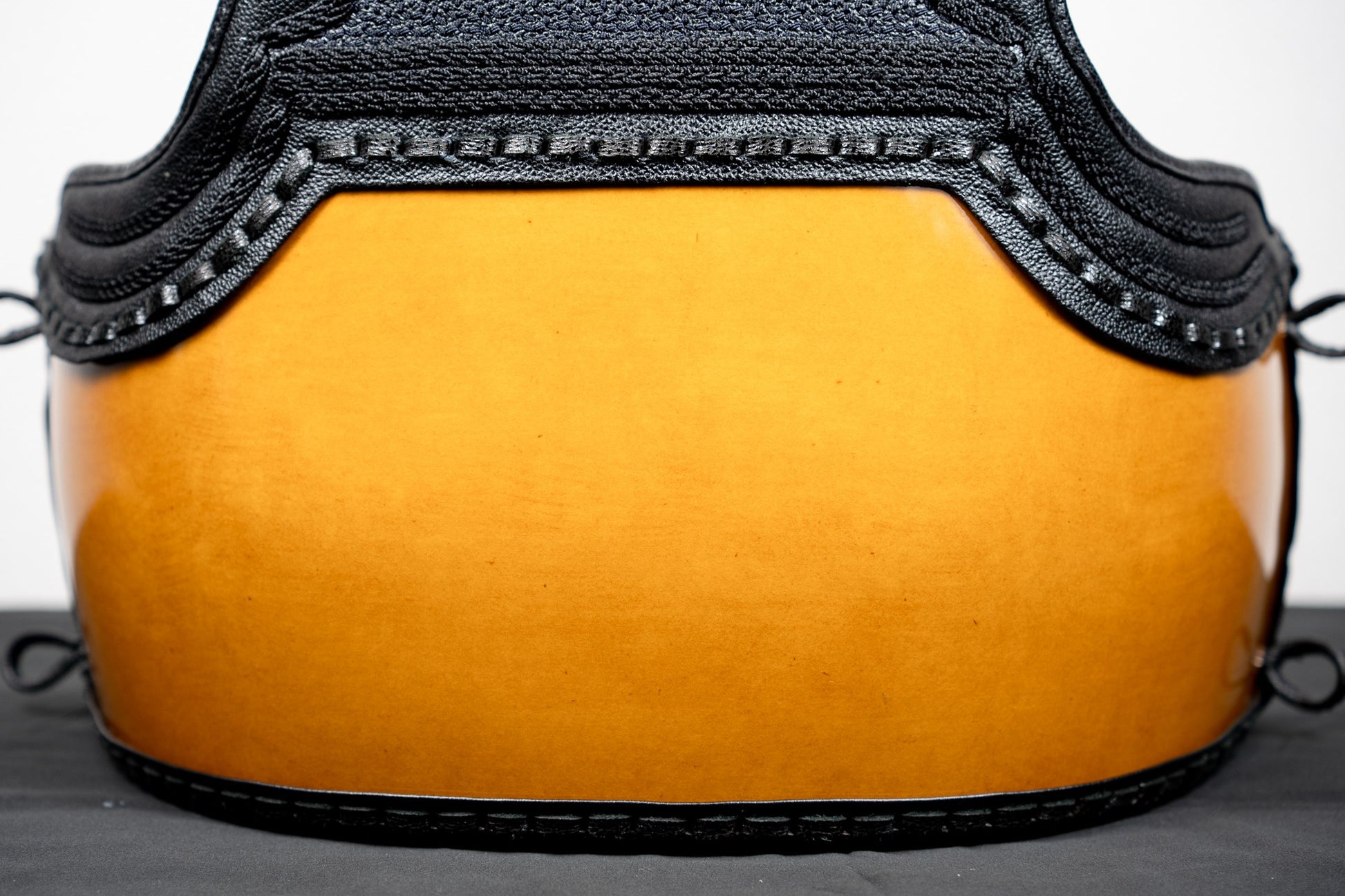 Close-up of hand-painted Fuki Urushi finish on premium Fiber Do